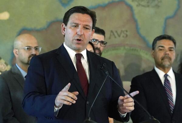 FILE - Florida Gov. Ron DeSantis speaks at Miami's Freedom Tower, on Monday, May 9, 2022. Florida Gov. Ron DeSantis on Thursday, May 26, 2022 signed into a law sweeping property insurance legislation that creates a $2 billion reinsurance fund and rewrites rules on coverage denials and attorney fees, in a move to stabilize rising costs and insurer losses.  (AP Photo/Marta Lavandier, File)