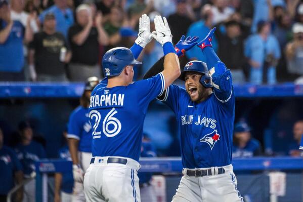 Schneider has 4 hits and 4 RBIs, Chapman drives in 3 as the Blue Jays rout  the Red Sox 13-1