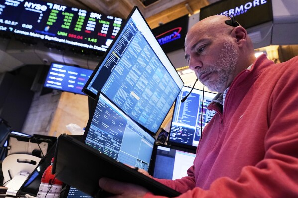 Trader Vincent Napolitano works on the floor of the New York Stock Exchange, Thursday, April 17, 2025. (AP Photo/Richard Drew)