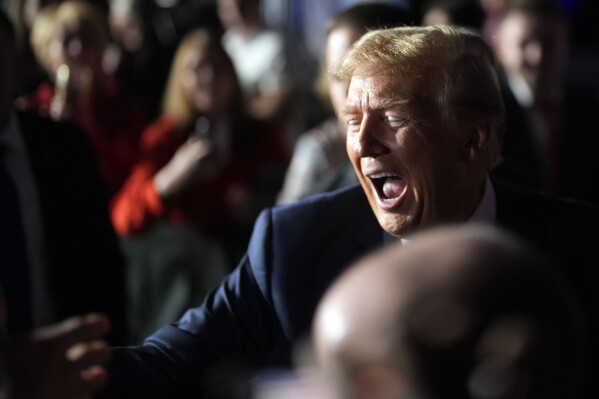 Republican presidential candidate former President Donald Trump greets people after a Fox News Channel town hall Tuesday, Feb. 20, 2024, in Greenville, S.C. (APPhoto/Chris Carlson)