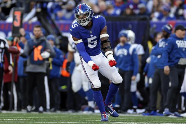 New York Giants defensive tackle Dexter Lawrence (97) takes the field for  an NFL football game against the Philadelphia Eagles on Sunday, Dec. 11,  2022, in East Rutherford, N.J. (AP Photo/Adam Hunger