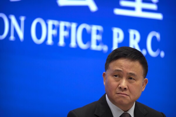 FILE - Pan Gongsheng, deputy governor of the People's Bank of China, listens to a journalist's question during a press conference at the State Council Information Office in Beijing, on March 3, 2023. Pan Gongsheng was named China’s central bank governor Tuesday, July 25, in the widely anticipated final major appointment of the ruling Communist Party’s once-a-decade change of power. (AP Photo/Mark Schiefelbein, File)