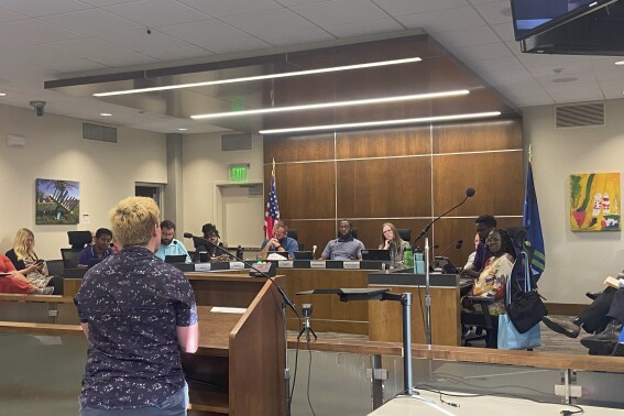 Archer Trip tells the Waterloo City Council on Aug. 21, 2023, about their experiences of undergoing conversion therapy as a child, in Waterloo, Iowa. (Maria Kuiper/The Courier via AP)