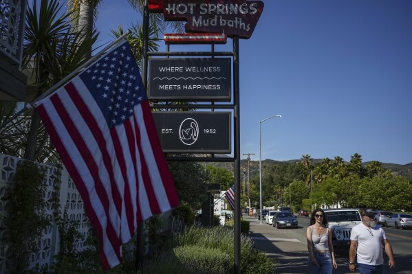 A sign for a hot spring is displayed on Tuesday, May 27, 2025, in Calistoga, Calif. (AP Photo/Annika Hammerschlag)