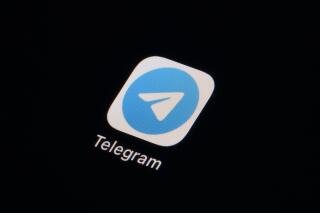 FILE - The icon for the instant messaging Telegram app is seen on a smartphone, Tuesday, Feb. 28, 2023, in Marple Township, Pa. A federal judge in Brazil on Wednesday, April 26, ordered a temporary suspension of messaging app Telegram, citing the social media platform's alleged failure to provide all information Federal Police requested on neo-Nazi chat groups. (AP Photo/Matt Slocum, File)