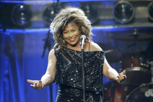 FILE - Tina Turner performs at The Sprint Center in Kansas City, Mo., on Oct. 1, 2008, the first stop on her Tina!: 50th Anniversary Tour. (AP Photo/Orlin Wagner, File)
