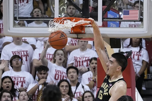 Purdue's Zach Edey dunks during the second half of an NCAA college basketball gam against Indiana, Tuesday, Jan. 16, 2024, in Bloomington, Ind. (AP Photo/Darron Cummings)