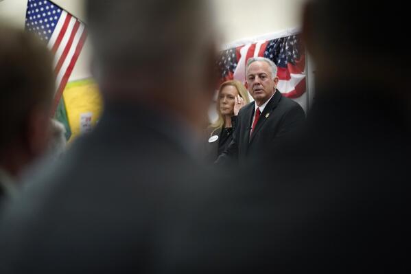 Newly elected sheriff Joe Lombardo,left, and his daughter Morgan