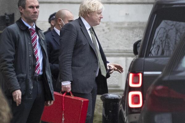 Britain's Prime Minister Boris Johnson leaves Downing Street in London, Friday Dec. 17, 2021. U.K. Prime Minister Boris Johnson’s Conservative Party has suffered a stunning defeat in North Shropshire in a parliamentary by-election that was a referendum on his government amid weeks of scandal and soaring COVID-19 infections. (Joshua Bratt/PA via AP)