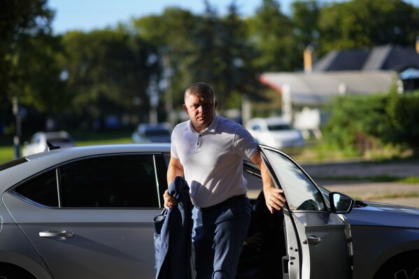 Former Slovak Prime Minister and head of leftist SMER - Social Democracy party Robert Fico arrives for an election rally in Michalovce, Slovakia, Wednesday, Sept. 6, 2023. Fico, who led Slovakia from 2006 to 2010 and again from 2012 to 2018, might reclaim the prime minister's office after the Sept. 30 election. He and his left-wing Direction ("Smer")-Social Democracy party have campaigned on a clear pro-Russian and anti-American message. (AP Photo/Petr David Josek)