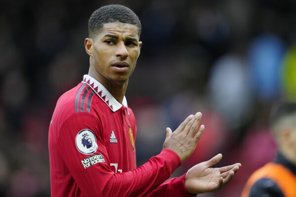 FILE - Manchester United's Marcus Rashford reacts at the end of the English Premier League soccer match between Manchester United and Southampton at Old Trafford stadium in Manchester, England, Sunday, March 12, 2023. Marcus Rashford has committed himself to five more years at Manchester United after the most prolific season of his career. The England forward ended speculation about his future by signing a new long-term deal that will keep him at Old Trafford through to 2028. (AP Photo/Jon Super, File)