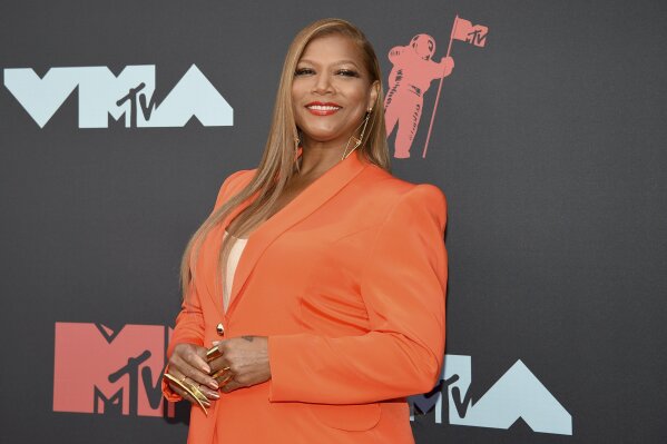 FILE - In this Aug. 26, 2019 file photo, Queen Latifah arrives at the MTV Video Music Awards in Newark, N.J. Queen Latifah, Rebecca Breeds and Thomas Middleditch are set to star in three new CBS shows for the 2020-21 season as the network adds a reimagined “Equalizer,” a show based on “The Silence of the Lambs" and a comedy about organ donation. (Photo by Evan Agostini/Invision/AP, File)