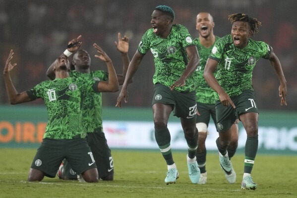 Nigeria's players celebrate winning the penalty shootout during the African Cup of Nations semifinal soccer match between Nigeria and South Africa, at the Peace of Bouake stadium in Bouake Bouake, Ivory Coast, Wednesday, Feb. 7, 2024. (APPhoto/Themba Hadebe)