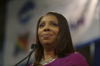 FILE - In this Sunday, Jan. 6, 2019 file photo, Attorney General of New York, Letitia James, speaks during an inauguration ceremony in New York. New York state’s attorney general has begun an investigation into the National Rifle Association. A spokeswoman for Attorney General Letitia James said Saturday, April, 27, 2019 that James’ office has issued subpoenas as part of an investigation related to the NRA. William A. Brewer, the NRA’s outside lawyer, said the NRA “will fully cooperate with any inquiry into its finances.” James, a Democrat, vowed during her campaign last year to investigate the NRA’s not-for-profit status if elected. (AP Photo/Seth Wenig, File)