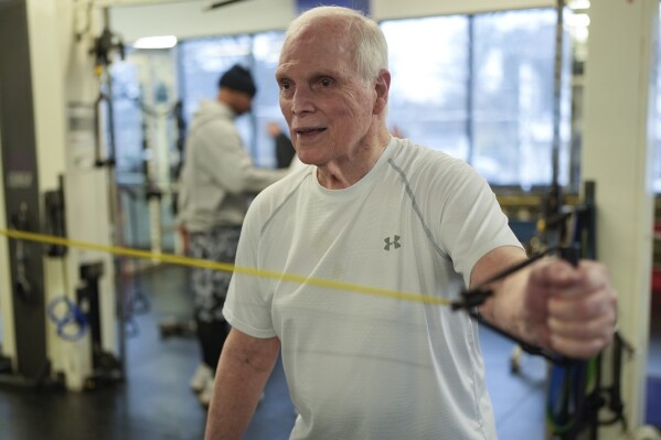 Dr. Grover Smith works out at STEPS Fitness, Wednesday, Feb. 12, 2025, in Nashville, Tenn. (AP Photo/George Walker IV)
