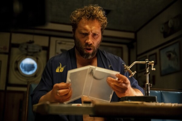 This image, released by IFC Films, shows Jai Courtney in a scene from "Dangerous animals." (IFC film via AP)