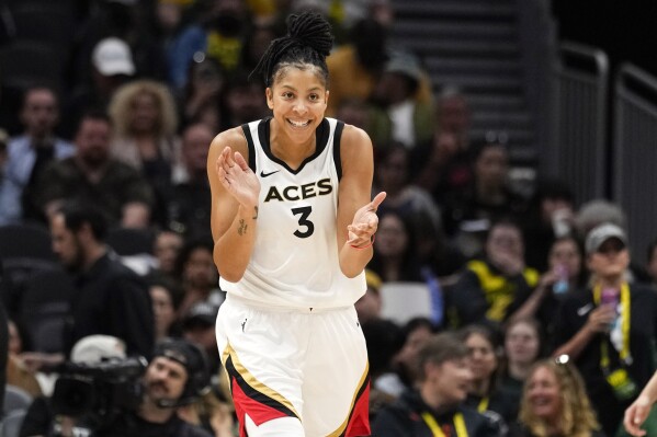 FILE - Las Vegas Aces forward Candace Parker (3) reacts during the first half of a WNBA basketball game against the Seattle Storm, Saturday, May 20, 2023, in Seattle. Parker plans on playing another season if she's healthy enough to do so. The two-time WNBA MVP missed the Las Vegas Aces run to a second straight league championship after having surgery on her left foot in late July. (AP Photo/Lindsey Wasson, File)