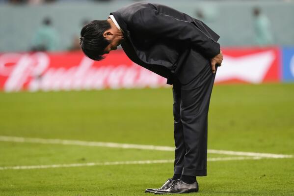 Japan's head coach Hajime Moriyasu bows after losing the penalty shootout of the World Cup round of 16 soccer match between Japan and Croatia at the Al Janoub Stadium in Al Wakrah, Qatar, Monday, Dec. 5, 2022. (AP Photo/Frank Augstein)