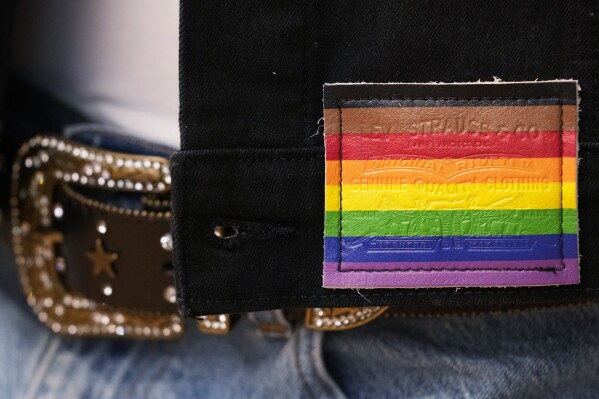 A jacket is displayed with a 2024 Levi's Pride collection patch at Levi's Store in downtown Chicago, Monday, June 10, 2024. Many big retailers, including Levi's, Target, Old Navy and Urban Outfitters, have put out Pride collections for years. (AP Photo/Nam Y. Huh)