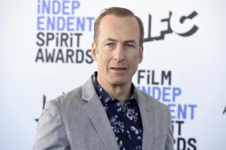 FILE - Bob Odenkirk arrives at the 35th Film Independent Spirit Awards on Feb. 8, 2020, in Santa Monica, Calif. The "Better Call Saul" star says he "had a small heart attack" but will "be back soon." The 58-year-old actor took to Twitter Friday, July 30, 2021, to make his first public statement since collapsing on the show's New Mexico set three days earlier. (Photo by Jordan Strauss/Invision/AP, File)