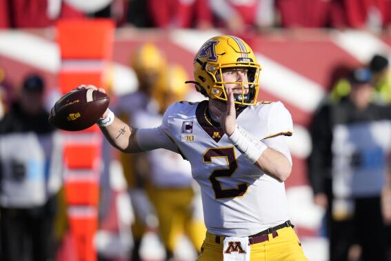 FILE - Minnesota quarterback Tanner Morgan (2) in action during an NCAA college football game between Minnesota and Indiana in Bloomington, Ind., Saturday, Nov. 20, 2021. (AP Photo/AJ Mast, File)