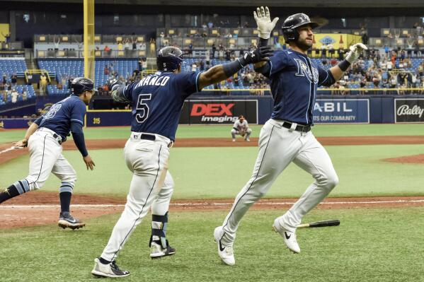 Tampa Bay Rays' Francisco Mejia, left, Wander Franco (5) and Kevin Kiermaier celebrate after a walk-off, two-run single by Austin Meadows beat the Baltimore Orioles 5-4 in a baseball game Wednesday, July 21, 2021, in St. Petersburg, Fla. (AP Photo/Steve Nesius)