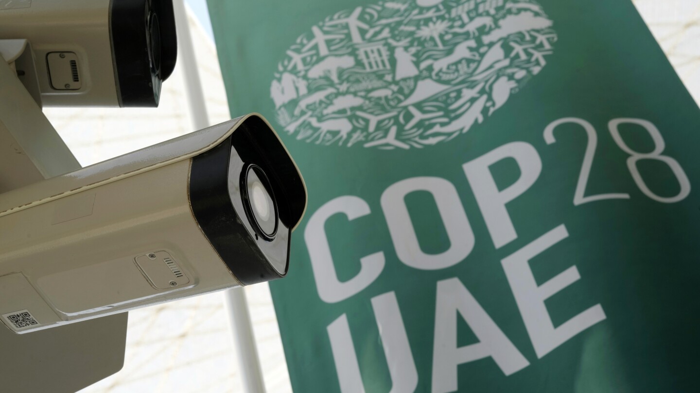 G42 cameras are visible at the COP28 U.N. Climate Summit, Saturday, Dec. 9, 2023, in Dubai, United Arab Emirates. (AP Photo/Peter Dejong) G42 cameras 