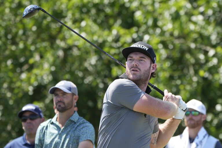 FILE - Grayson Murray hits the 18th tee during the first round of the PGA Zurich Classic golf tournament at TPC Louisiana in Avondale, Louisiana, Thursday, April 20, 2023. Grayson Murray, a two-time PGA Tour winner, died Saturday morning, May 25, 2024, at the age of 30. year, one day after he withdrew from the Charles Schwab Cup Challenge at Colonial.  (AP Photo/Gerald Herbert, File)