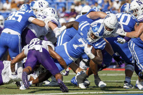 Duke's Jordan Waters (7) carries the ball for a touchdown during the first half of an NCAA college football game against Northwestern in Durham, N.C., Saturday, Sept. 16, 2023. (AP Photo/Ben McKeown)