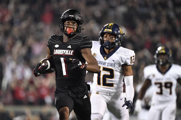 Louisville coach Jeff Brohm plays all nine quarterbacks on roster in  shutout win over Murray State 