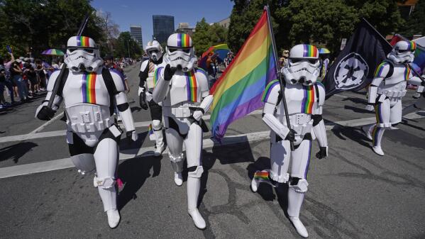 Participants wearing Star Wars costumes participate in the Pride Parade in Salt Lake City on Sunday, June 4, 2023. (AP Photo/Rick Bowmer)