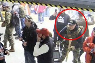 This image from the U.S. Capitol Police security video shows William Chrestman, circled in annotation by the Justice Department in the Motion for Emergency Stay and for Review of Release Order, in a tunnel underneath the U.S. Capitol on Jan 6. 2021, in Washington. Christian has been sentenced to more than four years in prison for his role in a mob's attack on the U.S. Capitol by U.S. District Judge Timothy Kelly on Friday, Jan. 11, 2024. (Justice Department via AP)
