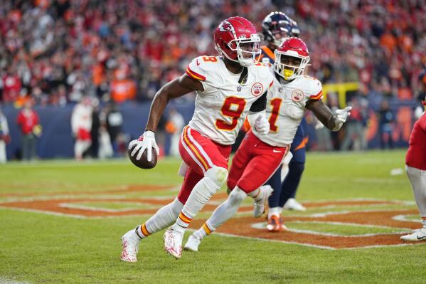 DENVER, CO - DECEMBER 11: Denver Broncos quarterback Russell Wilson (3)  scrampes out of the pocket in the first quarter during a game between the  Kansas City Chiefs and the Denver Broncos