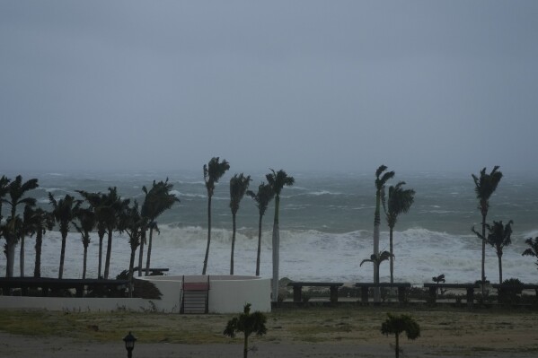 Strong waves caused by hurricane Norma hits a beach in San Jose del Cabo, Mexico, Saturday, Oct. 21, 2023. Norma had weakened and was downgraded to Category 1 on the hurricane wind scale. It was located 25 miles west of Cabo San Lucas storm with winds of 85 mph (140 kmh) and expected to make landfall on Saturday, according to the U.S. (AP Photo/Fernando Llano)