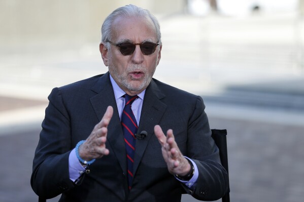 FILE- Nelson Peltz is interviewed on Oct. 10, 2017 in Cincinnati. During the Disney company's annual shareholder meeting Wednesday, April 3, 2024, investors will decide whether to back Disney chief executive Bob Iger, or grant two board seats to activist investor Peltz and his Trian Partners. (Kareem Elgazzar/The Cincinnati Enquirer via AP, File)