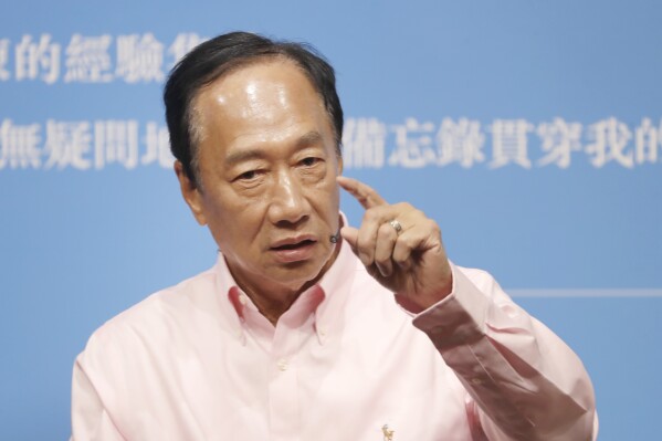 FILE - Chief Executive Officer of Hon Hai Precision Industry (Foxconn) Terry Gou answers to audience members during a media event announcing his new book ''30 memos written by Father Guo to young people'' in Taipei, Taiwan, Tuesday, Aug. 8, 2023. Aspiring Taiwanese independent presidential candidate Terry Gou has resigned from the board of Foxconn, the Apple supplier he founded nearly a half-century ago. (AP Photo/ Chiang Ying-ying, File)
