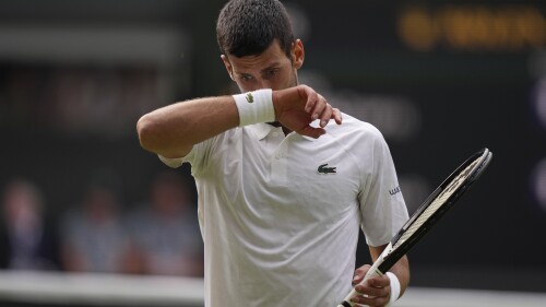 Serbia's Novak Djokovic after losing a point against Spain's Carlos Alcaraz during the men's singles final on day fourteen of the Wimbledon tennis championships in London, Sunday, July 16, 2023. (AP Photo/Alberto Pezzali)