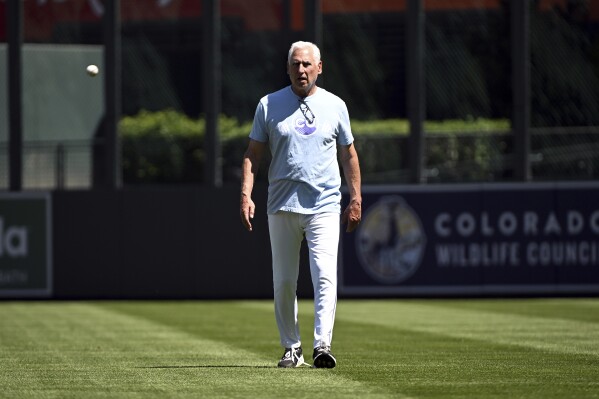 Colorado Rockies manager Bud Black walks off the field prior to a baseball game against the San Diego Padres, Sunday, May 11, 2025, in Denver. Black was fired as manager immediately following the game. (AP Photo/Geneva Heffernan)