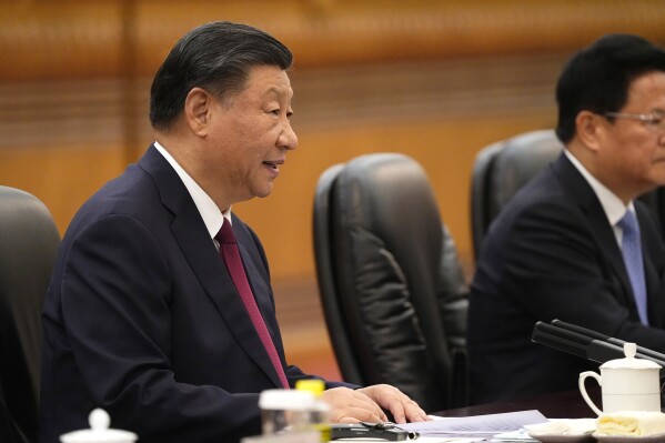 Chinese President Xi Jinping holds a talk with Colombian President Gustavo Petro, not in photo, at the Great Hall of the People Wednesday, Oct. 25, 2023, in Beijing, China.(Ken Ishii/Pool Photo via AP)