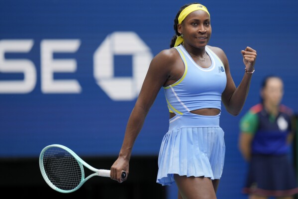 Coco Gauff, of the United States, reacts after defeating Varvara Gracheva, of France, during the first round of the U.S. Open tennis championships, Monday, Aug. 26, 2024, in New York. (AP Photo/Seth Wenig)