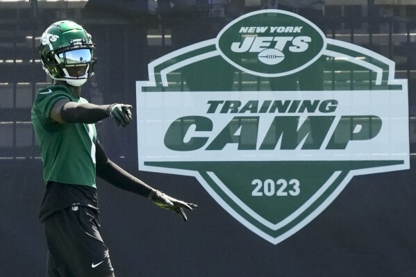 New York Jets cornerback Sauce Gardner (1) walks the sidelines during practice at the NFL football team's training facility, Friday, July 21, 2023, in Florham Park, N.J. (AP Photo/John Minchillo)
