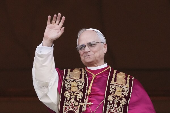 Pope Leo XIV appears on the central loggia of St. Peter's Basilica after being chosen the 267th pontiff of the Roman Catholic Church, at the Vatican, Thursday, May 8, 2025. (AP Photo/Alessandra Tarantino)