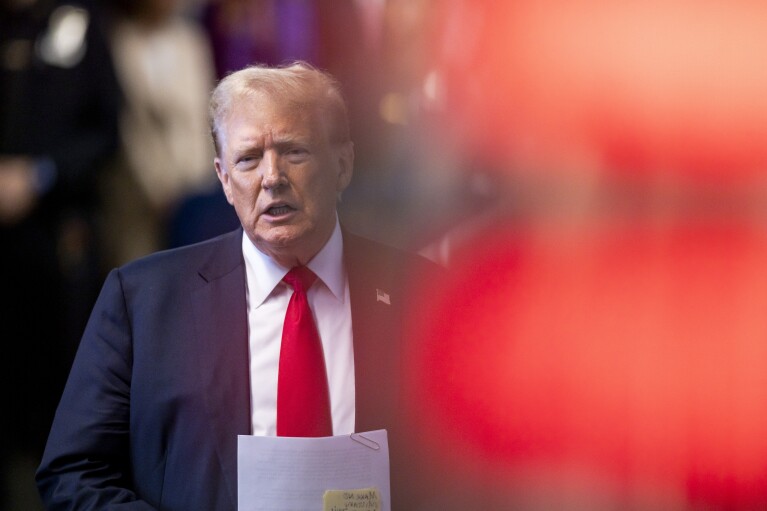 Former President Donald Trump talks to reporters outside of Manhattan Criminal Court, Tuesday, May 28, 2024, in New York. (Justin Lane/Pool Photo via AP)