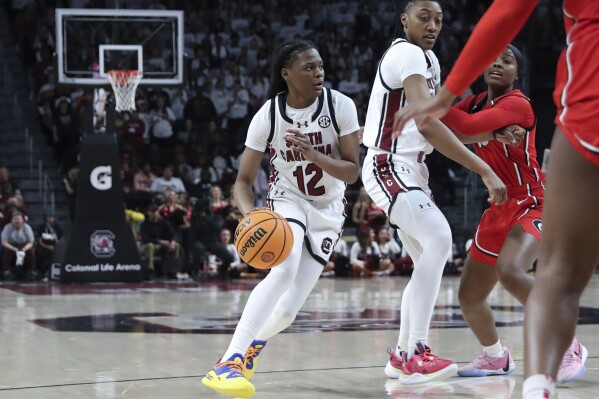 South Carolina guard MiLaysia Fulwiley (12) looks for a path to the basket during the second half of an NCAA college basketball game against Georgia, Sunday, Feb. 18, 2024, in Columbia, S.C. (APPhoto/Artie Walker Jr.)