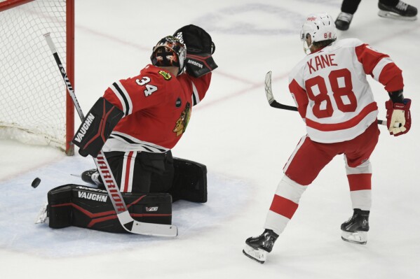 Patrick Kane scores in overtime in Chicago return, sending Red Wings past  the Blackhawks 3-2 | AP News