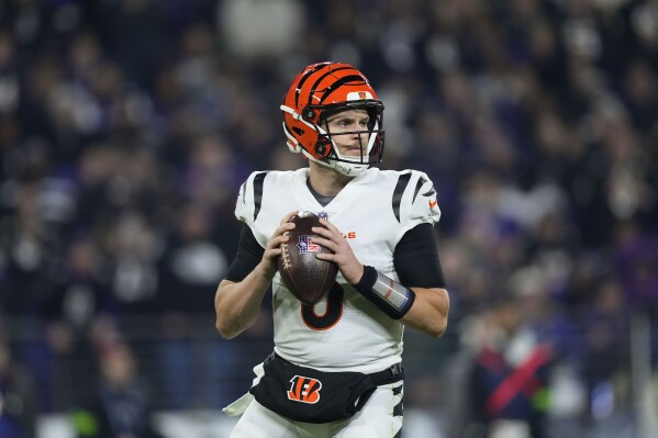 Cincinnati Bengals quarterback Jake Browning (6) looks to pass in the second half of an NFL football game against the Baltimore Ravens in Baltimore, Thursday, Nov. 16, 2023. (AP Photo/Matt Rourke)