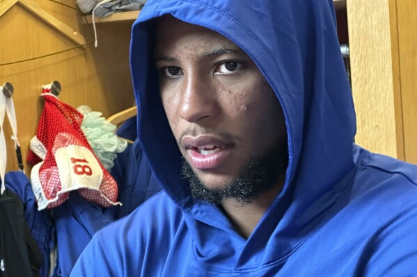 New York Giants running back Saquon Barkley speaks with reporters in the locker room following NFL football practice, Wednesday, Sept. 6, 2023, in East Rutherford, N.J. The Giants open the season on Sunday night at MetLife Stadium against the Dallas Cowboys. (AP Photo/Tom Canavan)