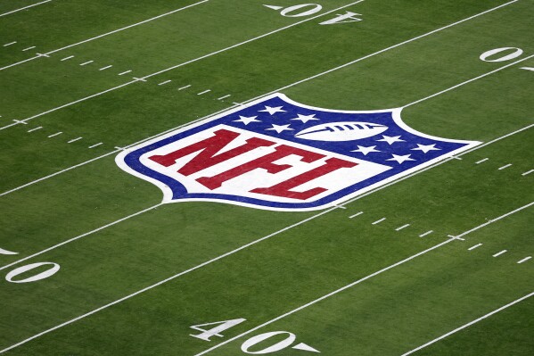 FILE - The NFL logo is seen during the NFL Super Bowl 58 football game Sunday, Feb. 11, 2024, in Las Vegas. Opening arguments are expected to begin Thursday, June 6, 2024, in federal court in a class-action lawsuit filed by “Sunday Ticket” subscribers claiming the NFL broke antitrust laws. The lawsuit was filed in 2015 and has withstood numerous challenges, including a dismissal that was overturned. (AP Photo/Adam Hunger, File)