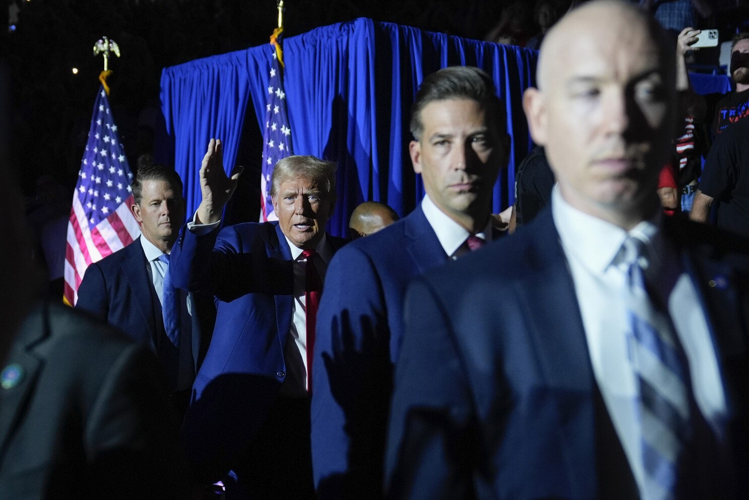 Trump holds first event since an apparent assassination attempt while Harris does a rare interview