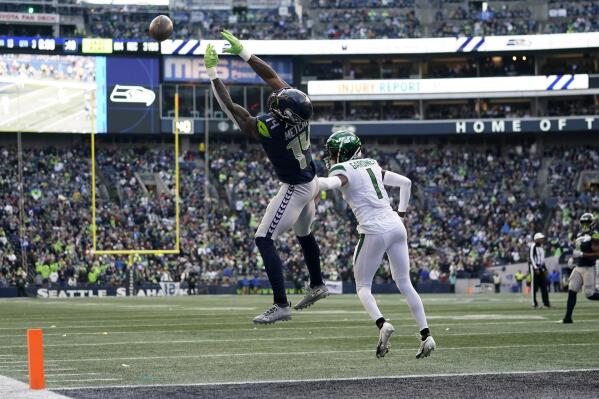 Seattle Seahawks defensive end Darrell Taylor (52) gets set during